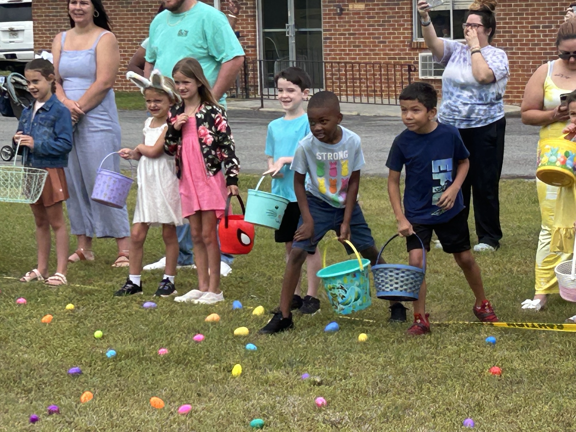 Nearly a 100 gather for community Egg Hunt
